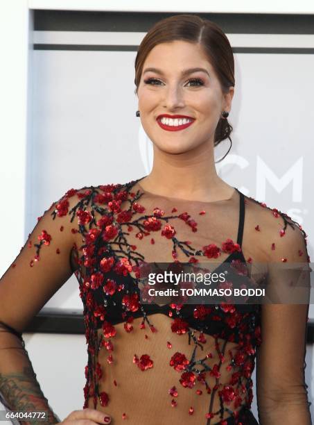 Recording artist Cassadee Pope arrives for the 52nd Academy of Country Music Awards on April 2 at the T-Mobile Arena in Las Vegas, Nevada. / AFP...