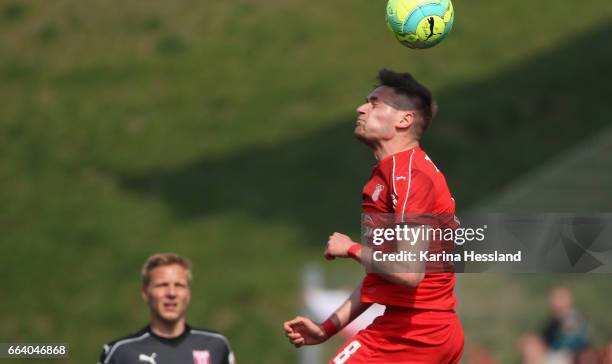 Jonas Nietfeld of Zwickau jumpes for a header during the Third League Match between FSV Zwickau and Hallescher FC on April 02, 2017 in Zwickau,...