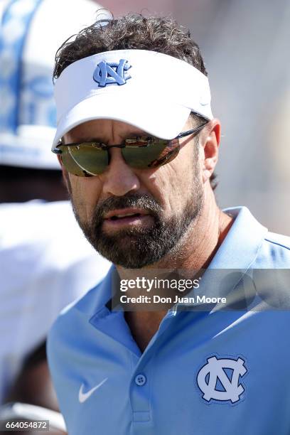 Head Coach Larry Fedora of the North Carolina Tar Heels during the game against the Florida State Seminoles at Doak Campbell Stadium on Bobby Bowden...