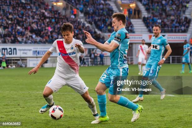 Jelle Vossen of Club Brugge, Thomas Foket of KAA Gentduring the Jupiler Pro League Play Off I match between KAA Gent and Club Brugge on April 02,...