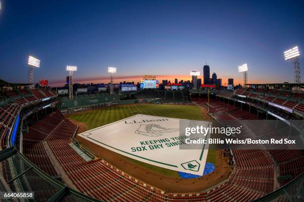 The sun rises over Fenway Park before the Boston Red Sox home opener against the Pittsburgh Pirates on April 3, 2017 at Fenway Park in Boston,...