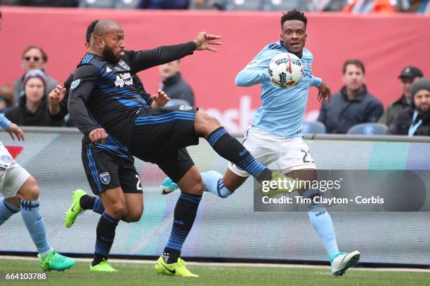 April 12: Victor Bernardez of San Jose Earthquakes clears while challenged by Rodney Wallace of New York City FC during the New York City FC Vs San...