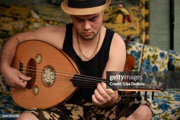 man playing turkish oud - arabic lutes stock pictures, royalty-free photos & images