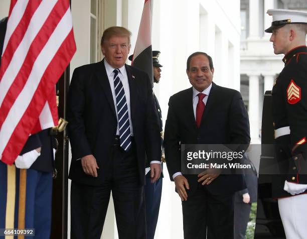 President Donald Trump welcomes Egyptian President Abdel Fattah Al Sisi during his arrival at the West Wing of the White House on April 3, 2017 in...