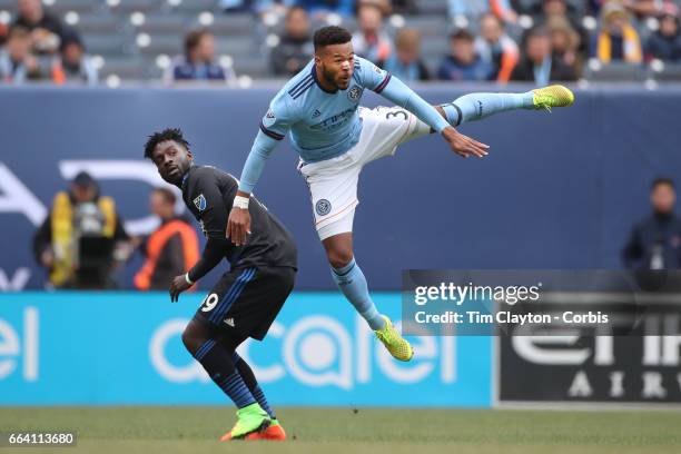 April 12: Ethan White of New York City FC heads clear from Simon Dawkins of San Jose Earthquakes during the New York City FC Vs San Jose Earthquakes...