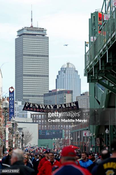 Fans walk down Lansdowne Street before the opening day game between the Boston Red Sox and the Pittsburgh Pirates at Fenway Park on April 3, 2017 in...