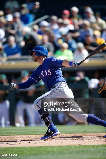 Will Middlebrooks of the Texas Rangers bats during the game against the Oakland Athletics at Hohokam Stadium on March 2, 2017 in Mesa, Arizona.