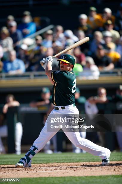 Chris Parmelee of the Oakland Athletics bats during the game against the Texas Rangers at Hohokam Stadium on March 2, 2017 in Mesa, Arizona.