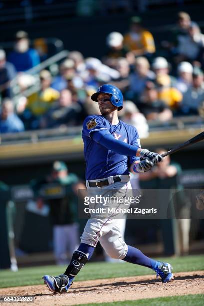 Will Middlebrooks of the Texas Rangers bats during the game against the Oakland Athletics at Hohokam Stadium on March 2, 2017 in Mesa, Arizona.