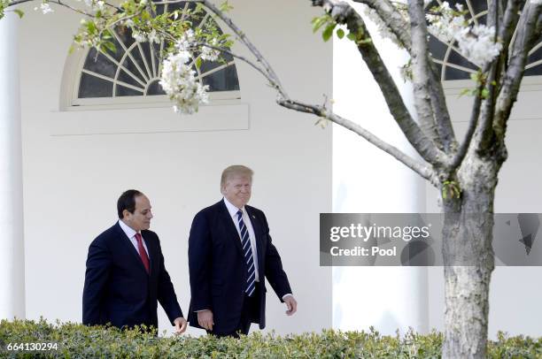 President Donald Trump and Egypt President Abdel Fattah Al Sisi leave the Oval Office of White House to walk to the Residenceon April 3, 2017 in...