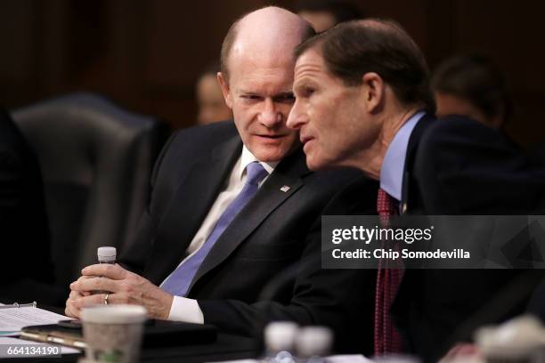 Senate Judiciary Committee members Sen. Chris Coons and Sen. Richard Blumenthal talks after Coons announced that he will be the 41st Democrat to vote...