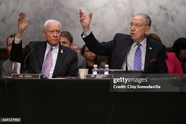 Senate Judiciary Committee member Sen. Orrin Hatch and Chairman Charles Grassley participate in an executive business meeting to debate and vote on...