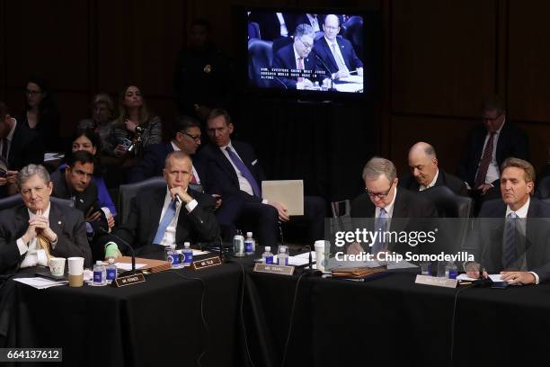 Senate Judiciary Committee members Sen. John Kennedy , Sen. Thom Tillis , Sen. Mike Crapo and Sen. Jeff Flake attend an executive business meeting to...