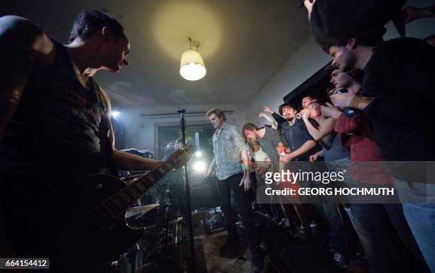 Campino , singer of German band Die Toten Hosen performs during a Living-Room-Gig in Vienna, Austria, on April 3, 2017. / AFP PHOTO / APA / GEORG...