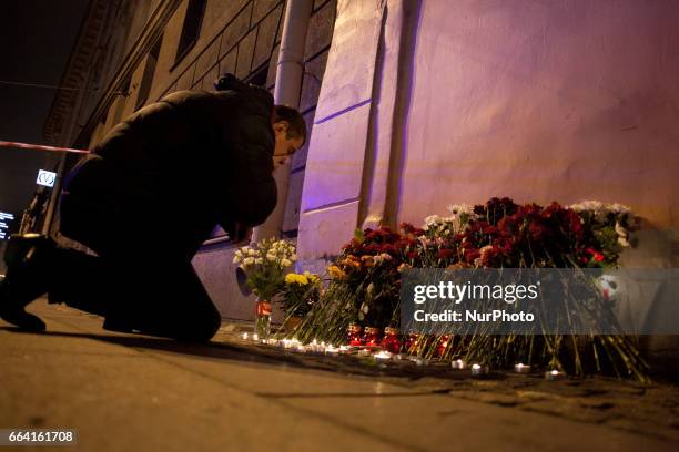 People lay flowers near the station Tekhnologichesky institut where as a result of explosion 10 people have died. St Petersburg, Russia. 3 april 2017