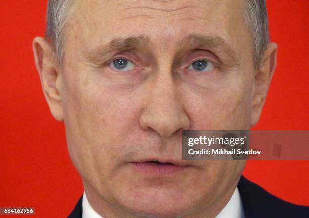 Russian President Vladimir Putin speaks during his joint press conference with Belarussian President Alexander Lukashenko at Konstantin Palace on...