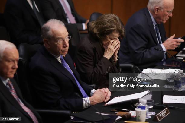 Senate Judiciary Committee ranking member Sen. Dianne Feinstein closes her eyes as the committee votes on Supreme Court nominee Judge Neil Gorsuch...