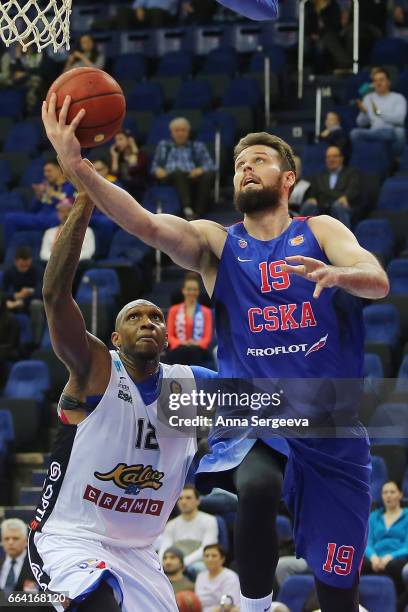 Joel Freeland of the CSKA Moscow shoots the ball against Cedric Simmons of the Kalev Tallinn during the game between CSKA Moscow v BC Kalev/Cramo...