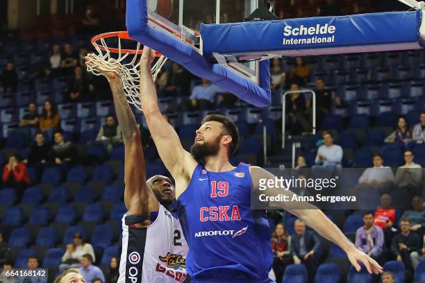 Joel Freeland of the CSKA Moscow shoots the ball against Cedric Simmons of the Kalev Tallinn during the game between CSKA Moscow v BC Kalev/Cramo...