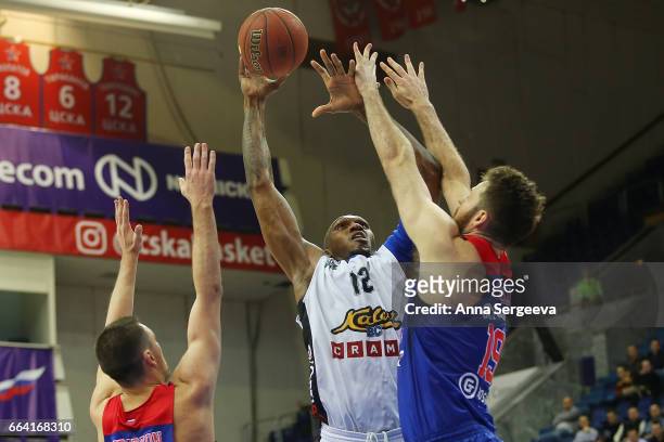 Cedric Simmons of the Kalev Tallinn shoots the ball against Joel Freeland of the CSKA Moscow during the game between CSKA Moscow v BC Kalev/Cramo...