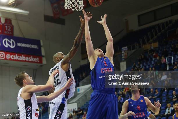 Semen Antonov of the CSKA Moscow shoots the ball against Mickell Gladness of the Kalev Tallinn during the game between CSKA Moscow v BC Kalev/Cramo...