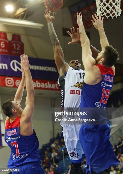 Cedric Simmons of the Kalev Tallinn shoots the ball against Joel Freeland of the CSKA Moscow during the game between CSKA Moscow v BC Kalev/Cramo...