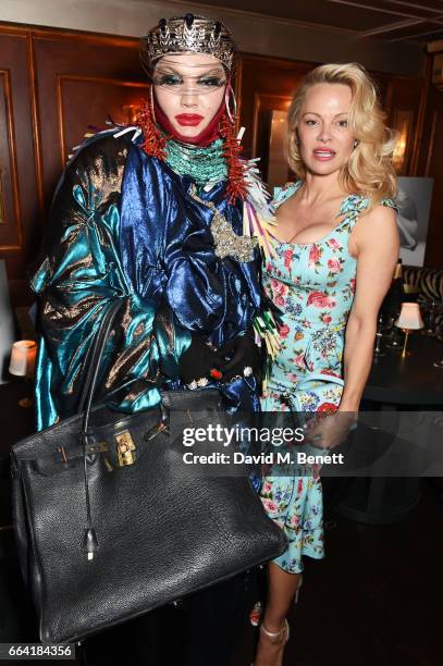 Daniel Lismore and Pamela Anderson attend the launch of the Coco De Mer Icons Collection at Albert's Club on April 3, 2017 in London, England.