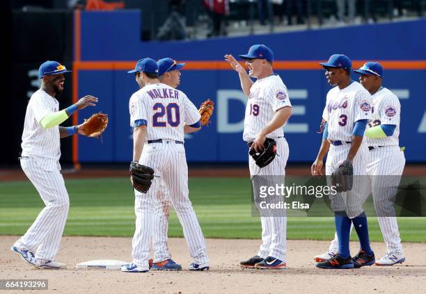 Jose Reyes of the New York Mets celebrates the win with teammates Neil Walker,Asdrubal Cabrera,Jay Bruce, Curtis Granderson and Yoenis Cespedes after...