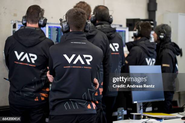 Team members of Van Amersfoort Racing watching on a screen in the garage during the official testdays FIA F3 European Championship at Red Bull Ring...