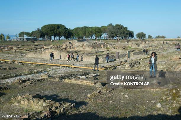 Tourists among the finds of the excavations of Sybaris after the inauguration of Sybaris Archaeological Park and its museum, in southern Italy, which...