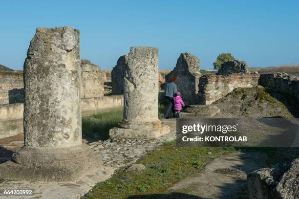 Tourists among the finds of the excavations of Sybaris after the inauguration of Sybaris Archaeological Park and its museum, in southern Italy, which...