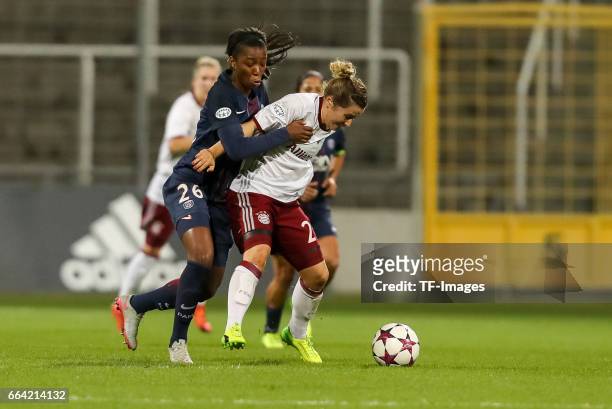 Grace Geyoro of Paris Saint Germain und Nicole Rolser of Bayern Munich battle for the ball during the Champions League match between Bayern Munich...