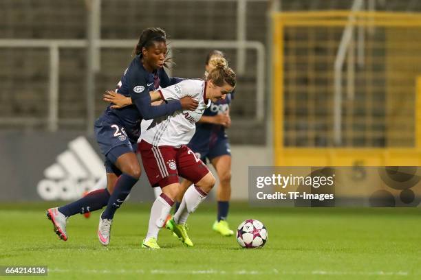 Grace Geyoro of Paris Saint Germain und Nicole Rolser of Bayern Munich battle for the ball during the Champions League match between Bayern Munich...