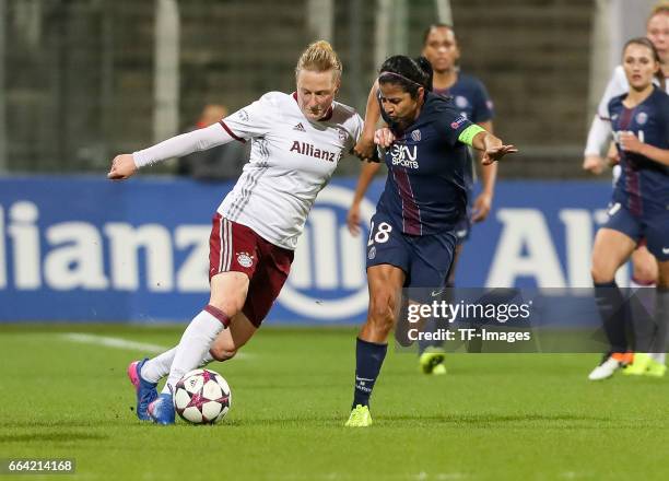 Melanie Behringer of Bayern Munich und Shirley Cruz Trana of Paris Saint Germain battle for the ball during the Champions League match between Bayern...