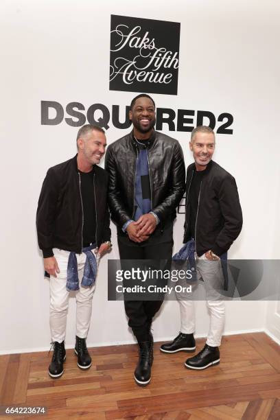 Designers Dean Caten and Dan Caten and basketball player Dwyane Wade attend Saks Fifth Avenue Celebrates the Exclusive Launch of The Dsquared2 x...