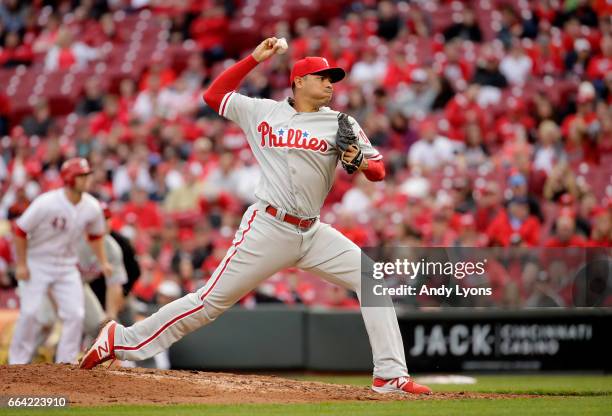 Jeanmar Gomez of the Philadelphia Phillies throws a pitch against the Cincinnati Reds on Opening Day for both team at Great American Ball Park on...