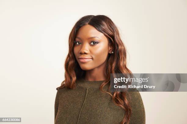 portrait of confident young woman - black studio stock pictures, royalty-free photos & images
