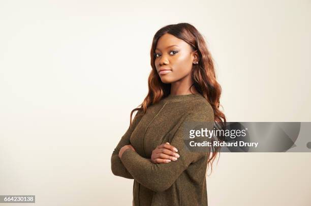 portrait of confident young woman with arms folded - arms crossed stock pictures, royalty-free photos & images