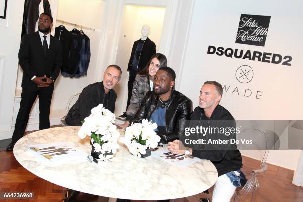 Dean Caten, Dwyane Wade and Dan Caten pose with a fan at the Exclusive Launch of the Dsquared2 x Dwyane Wade Capsule Collection at Saks Fifth Avenue...