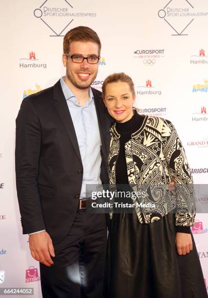 Erik Johannesen and guest attend the German Sports Journalism Award 2017 at Grand Elysee Hotel on April 03, 2017 in Hamburg, Germany.