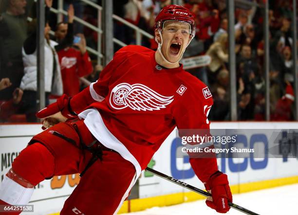 Evgeny Svechnikov of the Detroit Red Wings reacts to his game winning shoot out goal while playing the Ottawa Senators at Joe Louis Arena on April 3,...