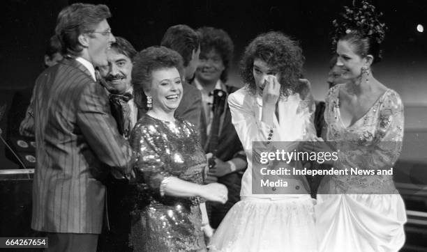 Eurovision Song Contest Winner Celine Dion of Switzerland on stage with Pat Kenny being congratulated in the RDS, Dublin, . .