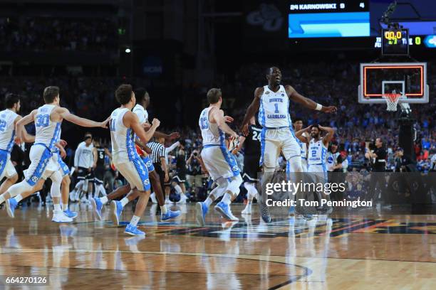 Theo Pinson of the North Carolina Tar Heels celebrates with teammates after defeating the Gonzaga Bulldogs during the 2017 NCAA Men's Final Four...