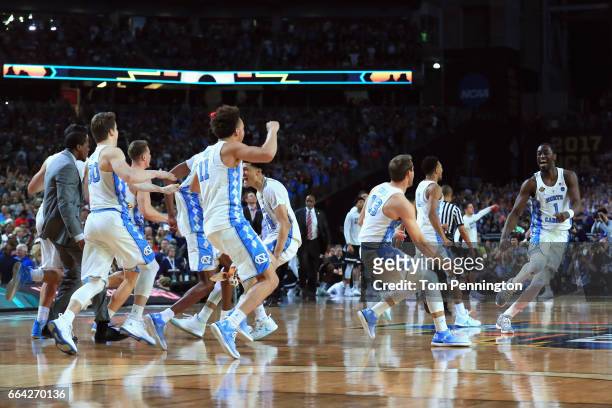 Theo Pinson of the North Carolina Tar Heels celebrates with teammates after defeating the Gonzaga Bulldogs during the 2017 NCAA Men's Final Four...