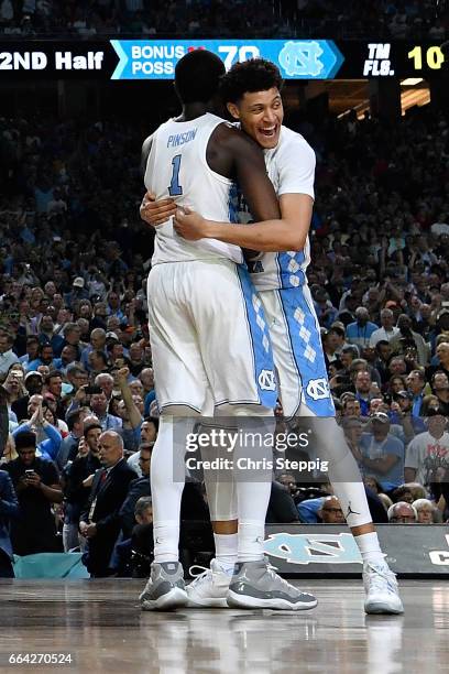 Theo Pinson and Joel Berry II of the North Carolina Tar Heels celebrate during the 2017 NCAA Photos via Getty Images Men's Final Four National...