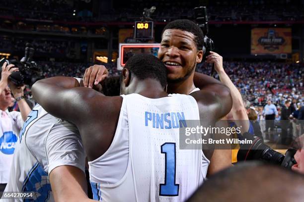 Theo Pinson and Kennedy Meeks of the North Carolina Tar Heels embrace after time expires during the 2017 NCAA Photos via Getty Images Men's Final...