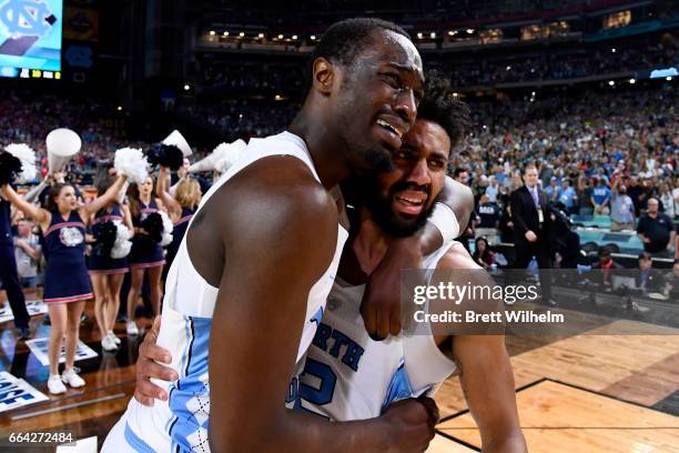 Theo Pinson and Joel Berry II of the North Carolina Tar Heels embrace after time expires during the 2017 NCAA Photos via Getty Images Men's Final...