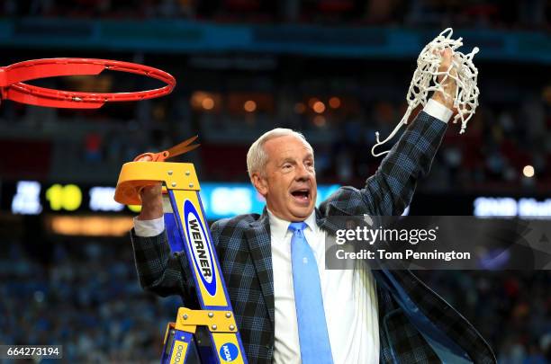 Head coach Roy Williams of the North Carolina Tar Heels cuts down the net after defeating the Gonzaga Bulldogs during the 2017 NCAA Men's Final Four...