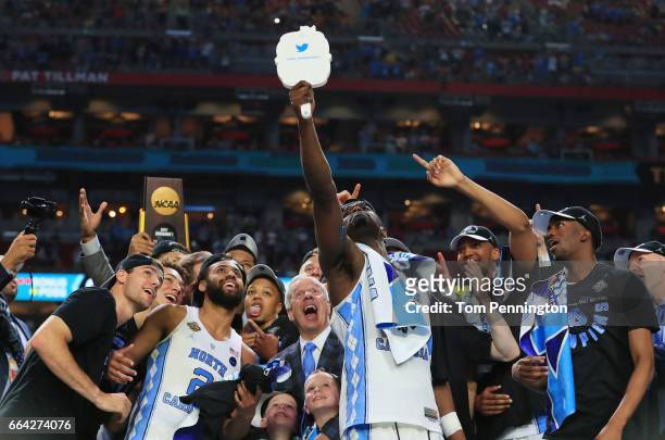 Theo Pinson of the North Carolina Tar Heels takes a selfie with his team after defeating the Gonzaga Bulldogs during the 2017 NCAA Men's Final Four...