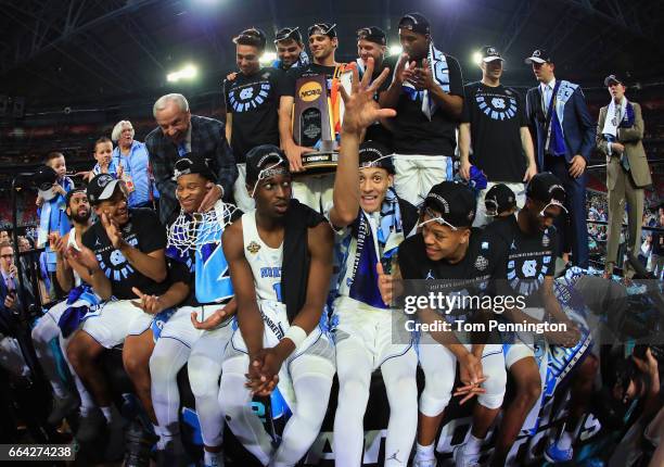 The North Carolina Tar Heels celebrate after defeating the Gonzaga Bulldogs during the 2017 NCAA Men's Final Four National Championship game at...